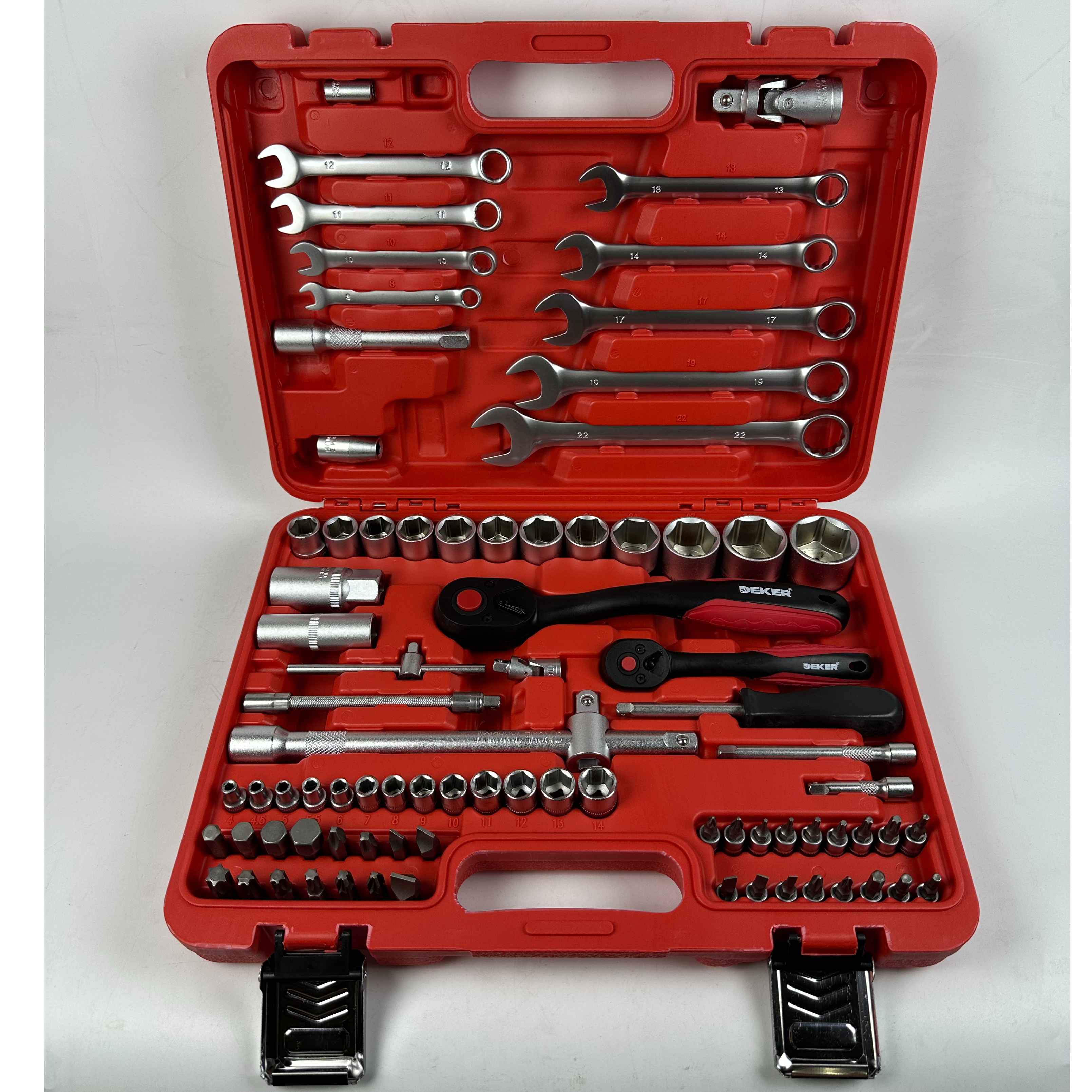 Professional mechanic using an auto repair tool kit in a garage